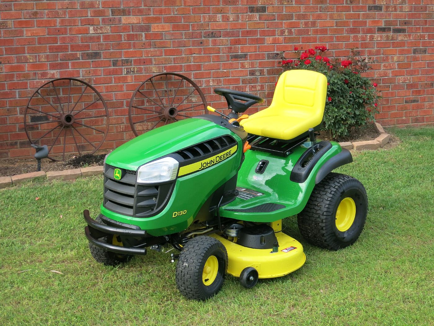 John Deere lawn tractor on a freshly mowed lawn
